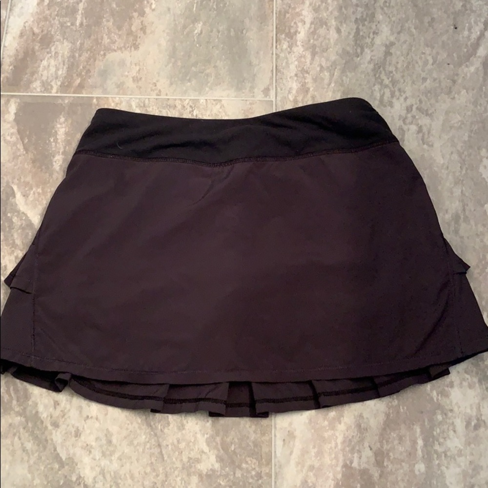 Ivivva black skort with zipper pocket in the back